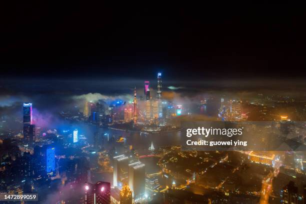 aerial panorama of the shanghai skyline - night market stock-fotos und bilder