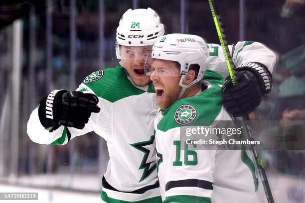 Roope Hintz celebrates a goal by Joe Pavelski of the Dallas Stars during the third period against the Seattle Kraken at Climate Pledge Arena on March...