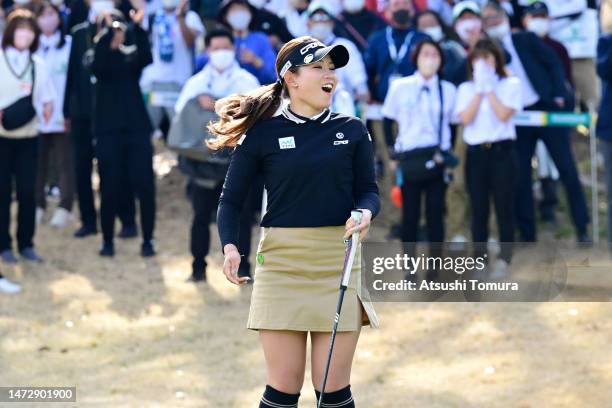 Hikaru Yoshimoto of Japan celebrates holing the winning putt on the 18th green during the playoff second hole following the final round of Meiji...