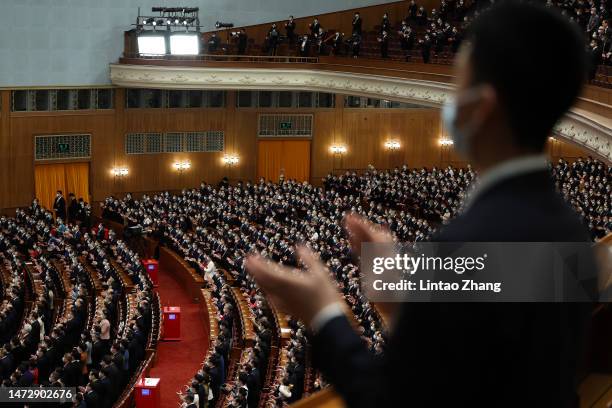 Delegates attend the fifth plenary session of the National People's Congress on March 12, 2023 in Beijing, China. China's annual political gathering,...