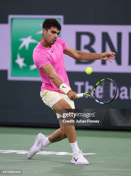 Carlos Alcaraz of Spain in action against Thanasi Kokkinakis of Australia during the BNP Paribas Open on March 11, 2023 in Indian Wells, California.