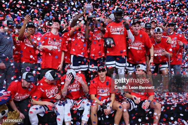 Arizona Wildcats celebrate their 61-59 win over the UCLA Bruins in the championship game of the Pac-12 basketball tournament at T-Mobile Arena on...