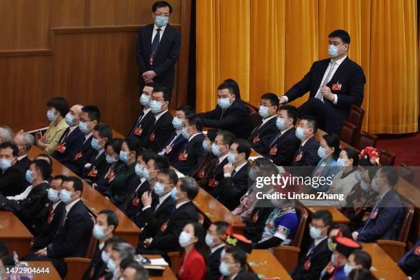 Chinese Basketball Association president Yao Ming, also a deputy to the 14th National People's Congress , attends the fifth plenary session of the...