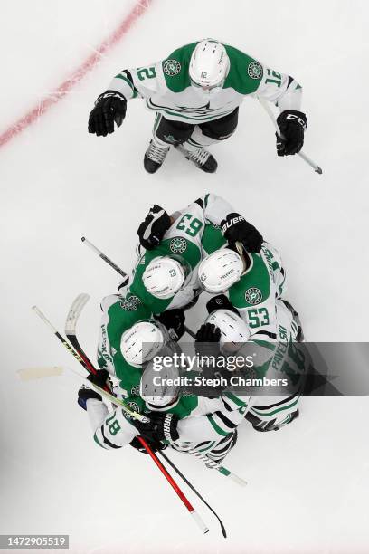 The Dallas Stars celebrate an overtime goal by Miro Heiskanen against the Seattle Kraken at Climate Pledge Arena on March 11, 2023 in Seattle,...