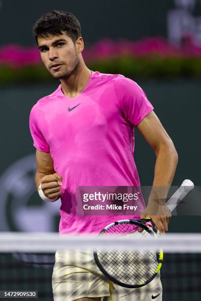 Carlos Alcaraz of Spain celebrates against Thanasi Kokkinakis of Australia in the second round of the BNP Paribas Open on March 11, 2023 in Indian...