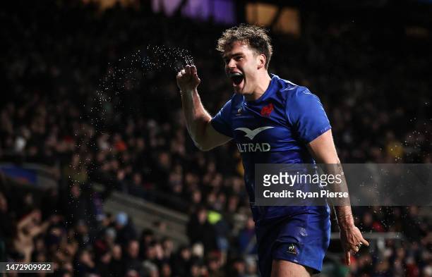 Damian Penaud of France celebrates scoring their side's seventh try during the Guinness Six Nations Rugby match between England and France at...