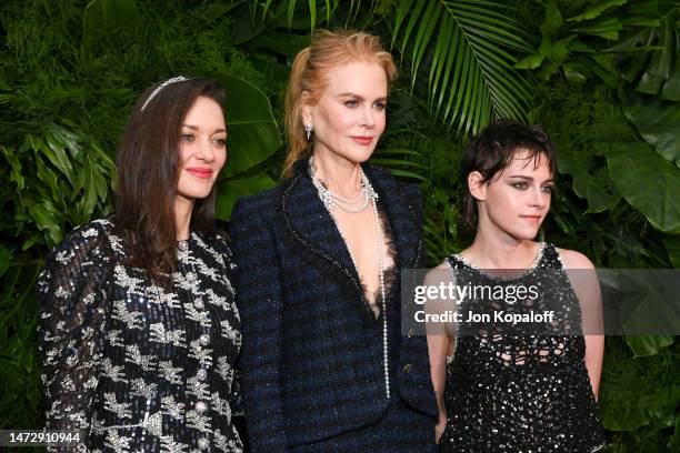 Marion Cotillard, wearing CHANEL, Nicole Kidman, wearing CHANEL and Kristen Stewart, wearing CHANEL attend the CHANEL and Charles Finch Pre-Oscar...