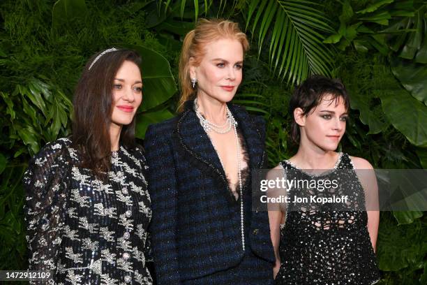 Marion Cotillard, wearing CHANEL, Nicole Kidman, wearing CHANEL and Kristen Stewart, wearing CHANEL attend the CHANEL and Charles Finch Pre-Oscar...