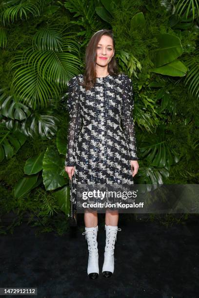 Marion Cotillard, wearing CHANEL attends the CHANEL and Charles Finch Pre-Oscar Awards Dinner on March 11, 2023 in Beverly Hills, California.