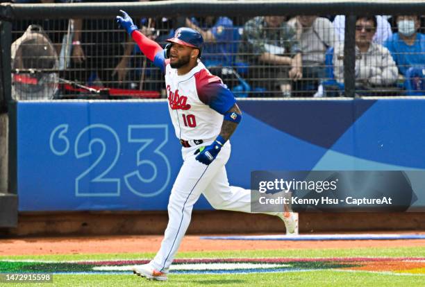 Yoán Moncada of Team Cuba hits a solo homerun at the bottom of the 2nd inning during the World Baseball Classic Pool A game between Chinese Taipei...