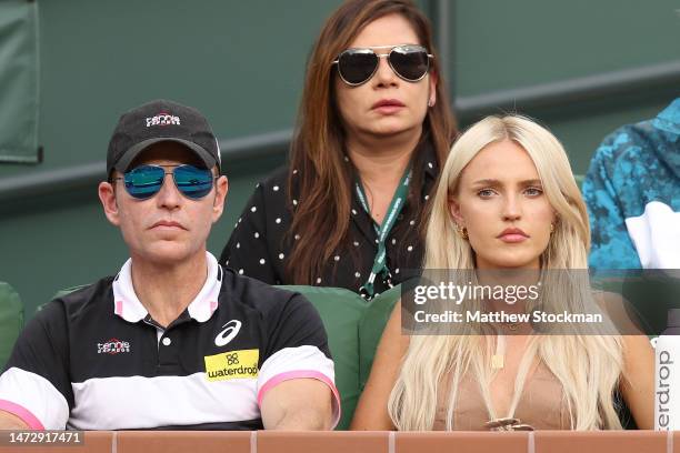 Michael Russell and Morgan Riddle watch Taylor Fritz play Ben Shelton during the BNP Paribas Open at the Indian Wells Tennis Garden on March 11, 2023...