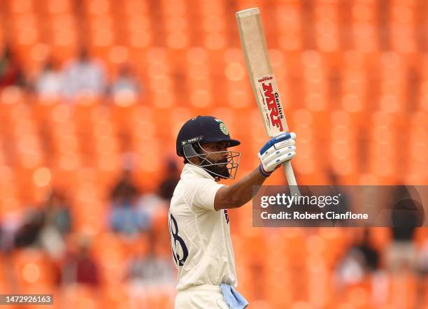 Virat Kohli of India celebrates on scoring his 150 runs during day four of the Fourth Test match in the series between India and Australia at...