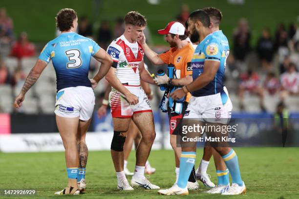 Toby Couchman of the Dragons is assessed for a HIA during the round two NRL match between the St George Illawarra Dragons and the Gold Coast Titans...