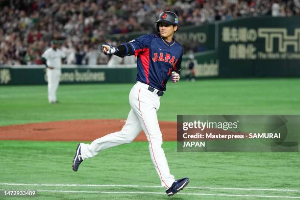 Shohei Ohtani of Japan celebrates hitting a three run home run to make it 3-0 in the first inning during the World Baseball Classic Pool B game...