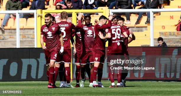 Players of Torino celebrate during the Serie A match between US Lecce and Torino FC at Stadio Via del Mare on March 12, 2023 in Lecce, Italy.