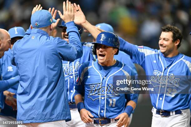 Sal Frelick of Team Italy scores after Nicky Lopez of Team Italy hits a 2 RBI tripple at the bottom of the 4th inning during the World Baseball...