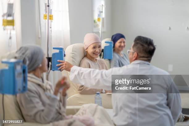 Oncologist Making Rounds to Oncology Patients