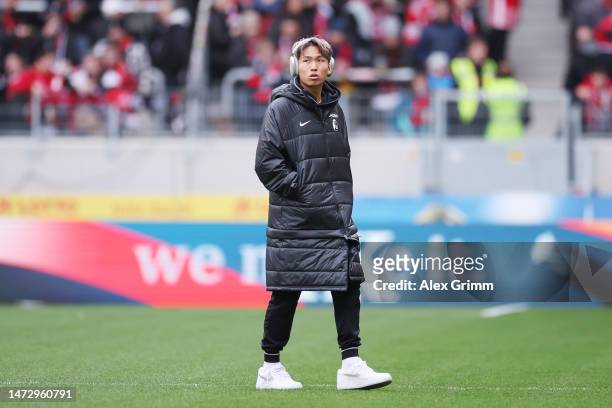 Jeong Woo-Yeong of Sport-Club Freiburg inspects the pitch prior to the Bundesliga match between Sport-Club Freiburg and TSG Hoffenheim at Europa-Park...