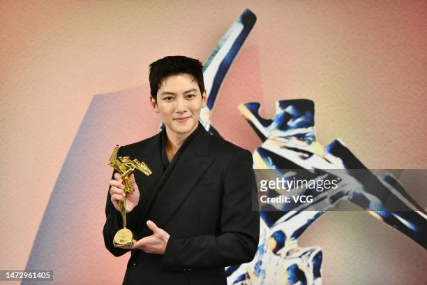 South Korean actor Ji Chang-wook poses with his trophy during the 16th Asian Film Awards at Hong Kong Palace Museum on March 12, 2023 in Hong Kong,...