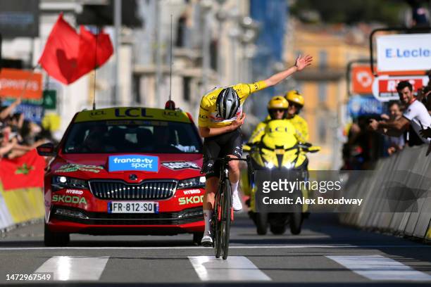 Tadej Pogacar of Slovenia and UAE Team Emirates - Yellow Leader Jersey celebrates at finish line as race winner during the 81st Paris - Nice 2023,...