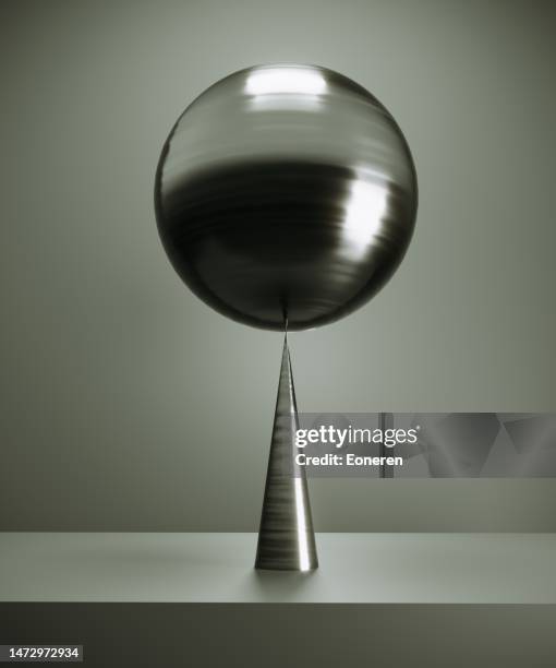 sphere balance concept - spiked stock pictures, royalty-free photos & images