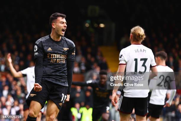 Gabriel Martinelli of Arsenal celebrates after Antonee Robinson of Fulham concedes an own goal, which is later ruled out following an offside...