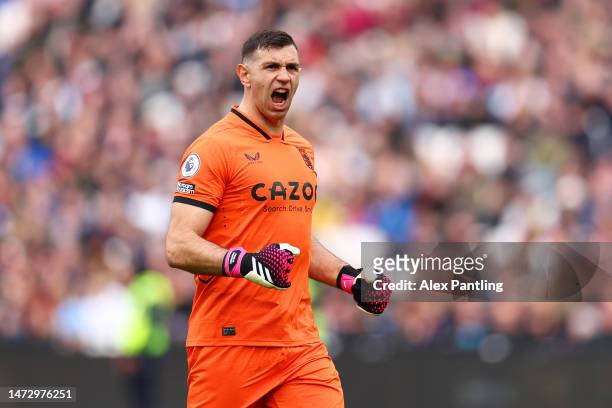 Emiliano Martinez of Aston Villa celebrates the team's first goal during the Premier League match between West Ham United and Aston Villa at London...