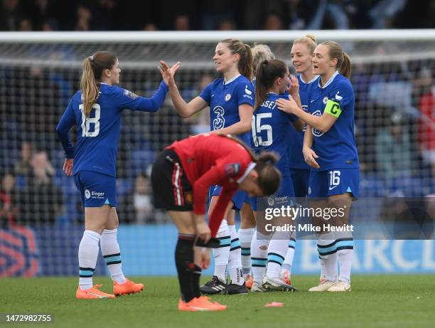 Players of Chelsea celebrate victory following the FA Women's Super League match between Chelsea and Manchester United at Kingsmeadow on March 12,...