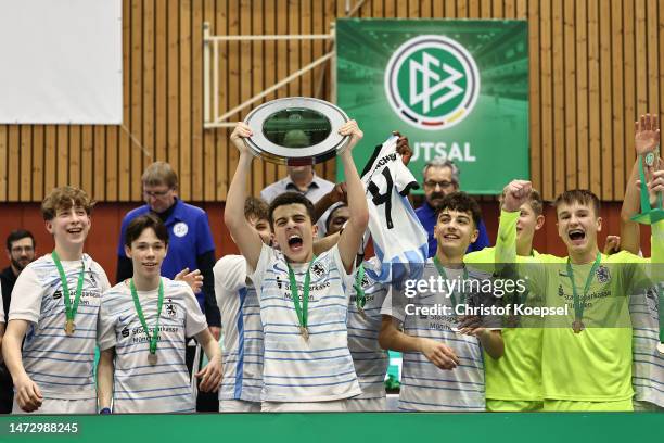 The team of 1860 Muenchen lifts the trophy on the podium after winning 3-0 the C-Junior final match between 1860 Muenchen and FC Radolfzelle 3-0 of...