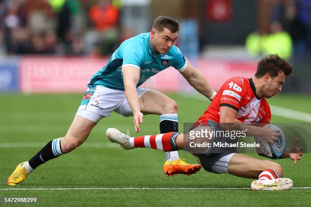 Ben Meehan of Gloucester is challenged by Harry Simmons of Leicester during the Gallagher Premiership Rugby match between Gloucester Rugby and...