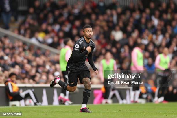 Gabriel Jesus of Arsenal runs onto the pitch as they replace Leandro Trossard as a substitute during the Premier League match between Fulham FC and...