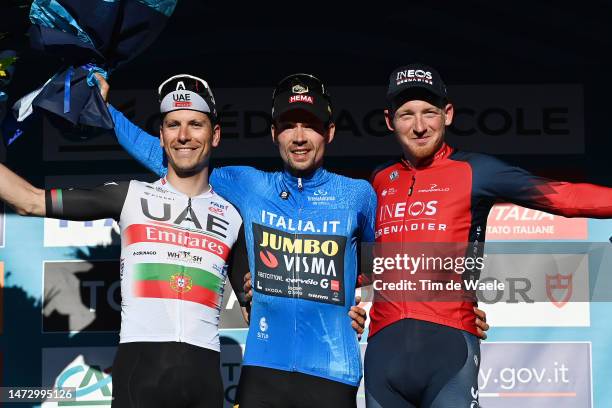 Joao Almeida of Portugal and UAE Team Emirates on second place, race winner Primoz Roglic of Slovenia and Team Jumbo - Visma and Tao Geoghegan Hart...