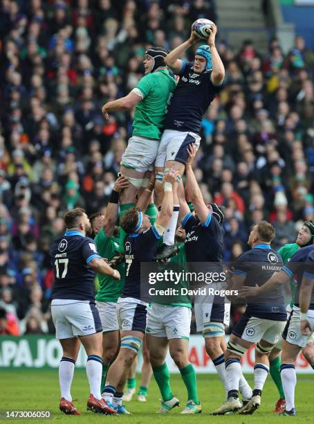 Scott Cummings of Scotland beats James Ryan of Ireland to the ball at the line-out during the Six Nations Rugby match between Scotland and Ireland at...