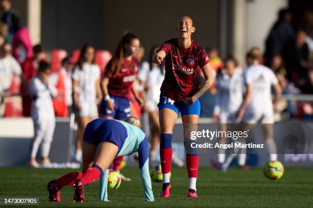 Virginia Torrecilla of Atletico de Madrid jokes with Hanna Lundkvist during the warm up prior to the Liga F match between Atletico de Madrid and Real...