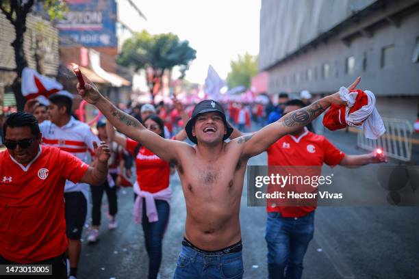 Fan of Toluca cheers prior the 11th round match between Toluca and Mazatlan FC as part of the Torneo Clausura 2023 Liga MX at Nemesio Diez Stadium on...