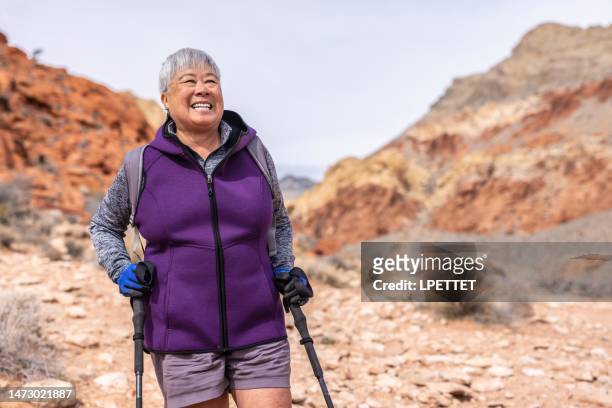 hiking - senior women hiking stock pictures, royalty-free photos & images