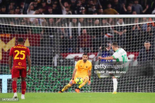 Domenico Berardi of US Sassuolo scores the team's third goal with a penalty kick during the Serie A match between AS Roma and US Sassuolo at Stadio...