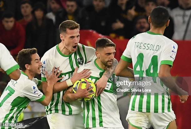 Domenico Berardi of US Sassuolo celebrates after scoring a penalty during the Serie A match between AS Roma and US Sassuolo at Stadio Olimpico on...