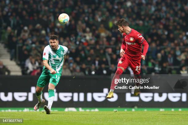 Adam Hlozek of Bayer 04 Leverkusen scores the team's third goal during the Bundesliga match between SV Werder Bremen and Bayer 04 Leverkusen at...