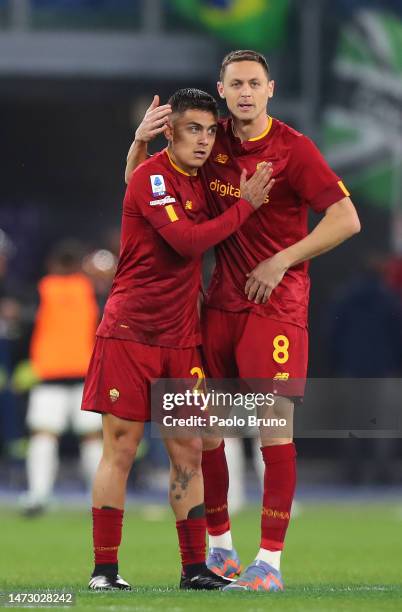 Paulo Dybala and Nemanja Matic of AS Roma interact during the Serie A match between AS Roma and US Sassuolo at Stadio Olimpico on March 12, 2023 in...