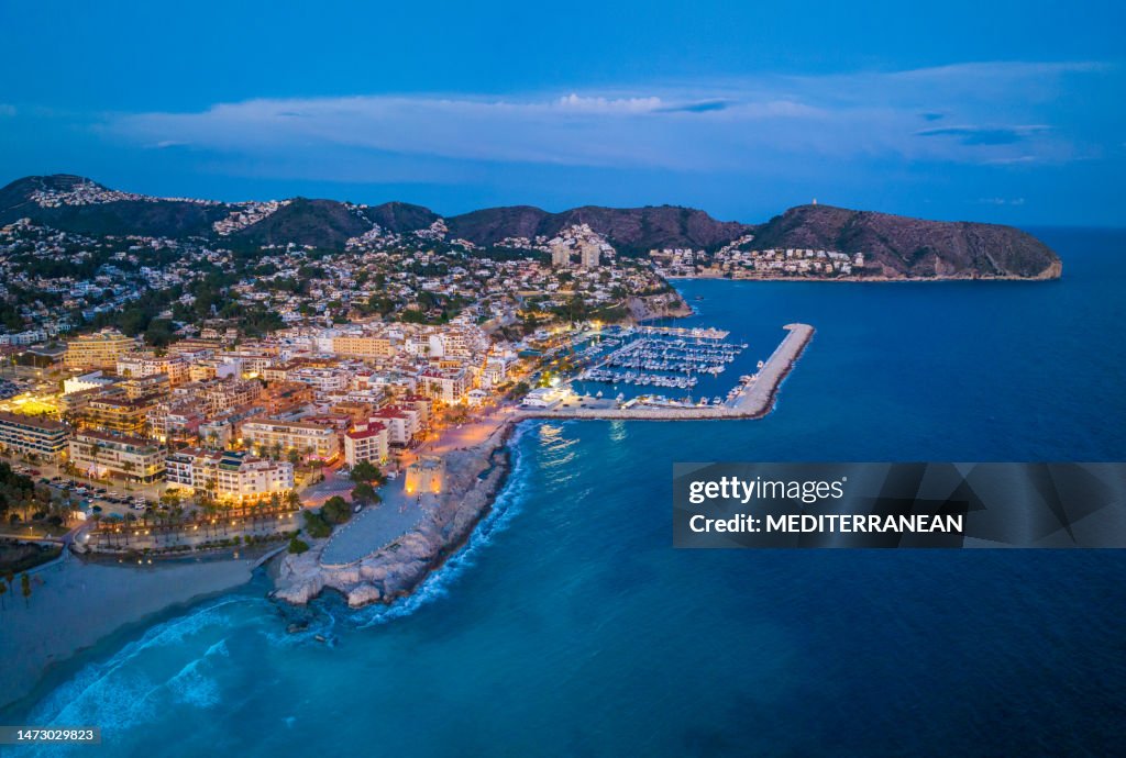 Moraira beach at sunset in Teulada Drone aerial skyline in Mediterranean Alicante