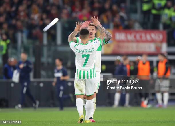 Andrea Pinamonti and Matheus Henrique of US Sassuolo interact during the Serie A match between AS Roma and US Sassuolo at Stadio Olimpico on March...