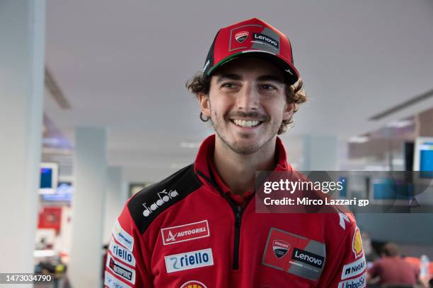 Francesco Bagnaia of Italy and Ducati Lenovo Team smiles in media center with journalists during the Portimao MotoGP Official Test at Portimao...