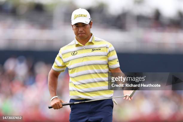Hideki Matsuyama of Japan looks on from the 16th green during the final round of THE PLAYERS Championship on THE PLAYERS Stadium Course at TPC...
