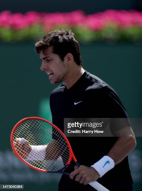 Cristian Garin of Chile reacts after winning a point in his match against Casper Ruud of Norway during the BNP Parisbas at the Indian Wells Tennis...