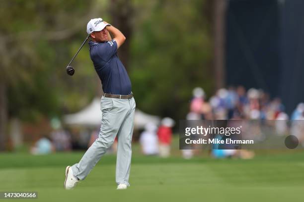 Tom Hoge of the United States plays an approach shot on the 11th hole during the final round of THE PLAYERS Championship on THE PLAYERS Stadium...