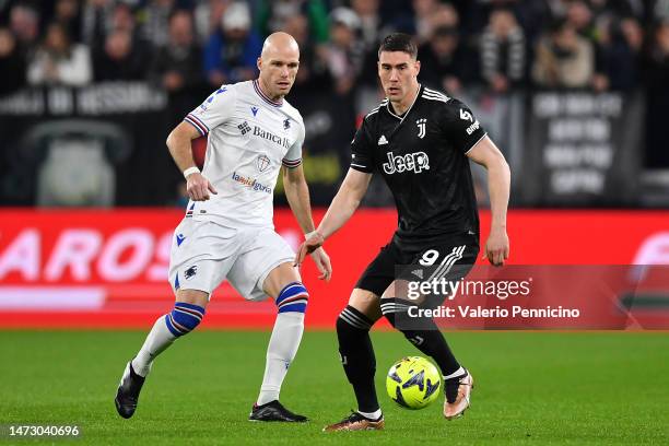 Dusan Vlahovic of Juventus battles for possession with Bram Nuytinck of UC Sampdoria during the Serie A match between Juventus and UC Sampdoria at on...