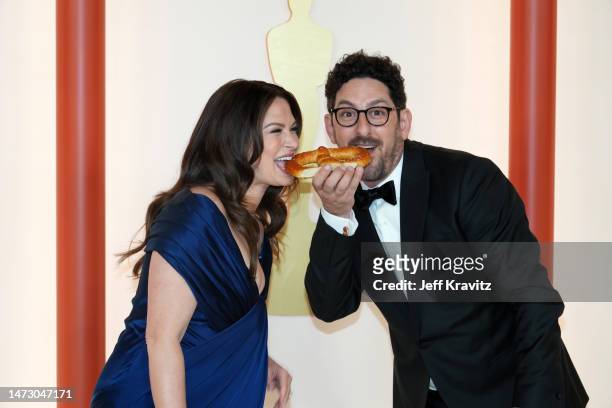 Katie Lowes and Adam Shapiro attend the 95th Annual Academy Awards on March 12, 2023 in Hollywood, California.