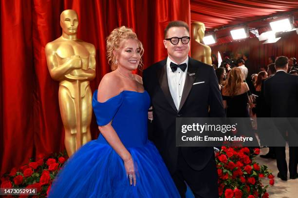 Jeanne Moore and Brendan Fraser attend the 95th Annual Academy Awards on March 12, 2023 in Hollywood, California.