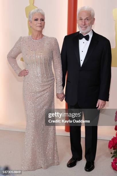 Jamie Lee Curtis and Christopher Guest attend the 95th Annual Academy Awards on March 12, 2023 in Hollywood, California.